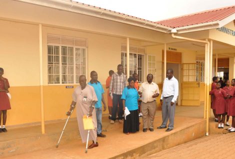 Members of the accesibility audit team inspect a public facility during the exercise.